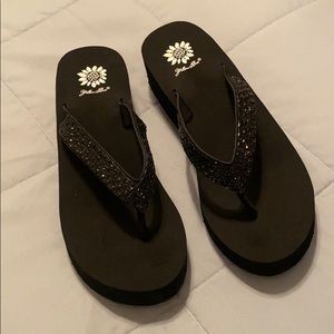 Yellow box flip flops